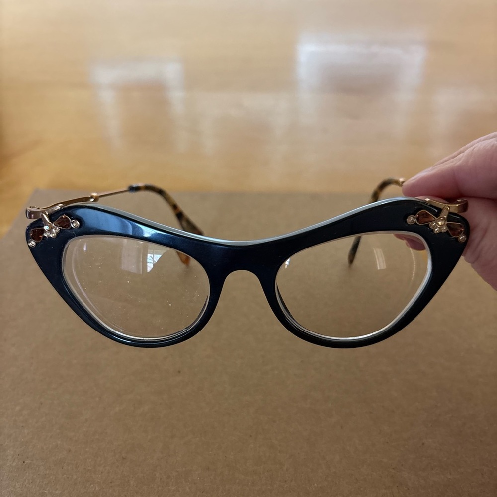 Miu Miu Classic Cat-Eye Glasses in Black with Gold/Brown Flower Accents
